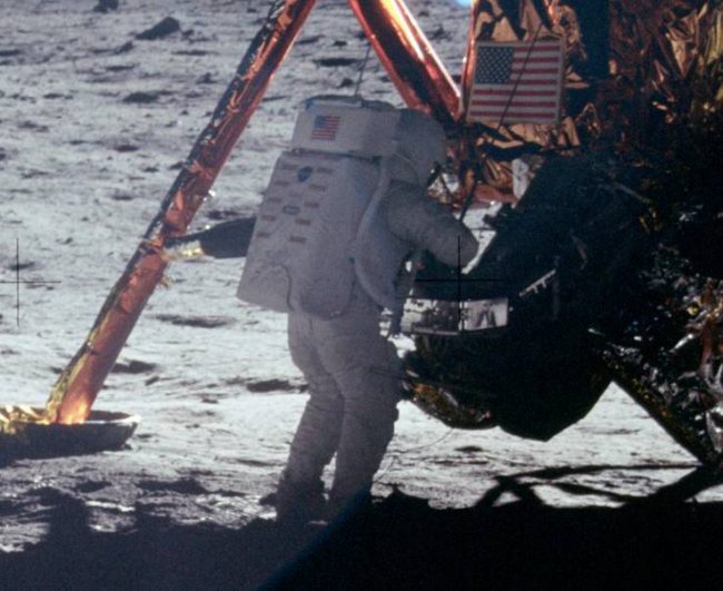 Neil Armstrong works at the LM in the only photo taken of him on the moon from the surface