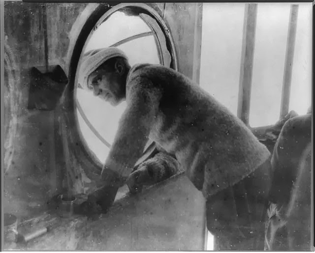 Umberto Nobile (1885-1978), designer of the "Norge" watching her departure from the base at Spitsbergen, from forward control car , 1926