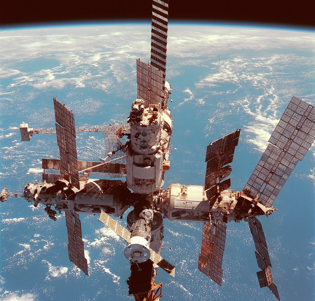 Russian Space Station Mir, backdropped against Earth, taken from the Space Shuttle Atlantis, photo:NASA