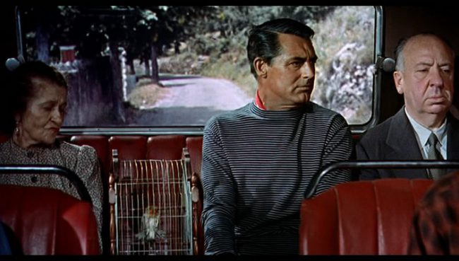 Cameo appearance of Hitchcock next to Cary Grant in his To Catch a Thief