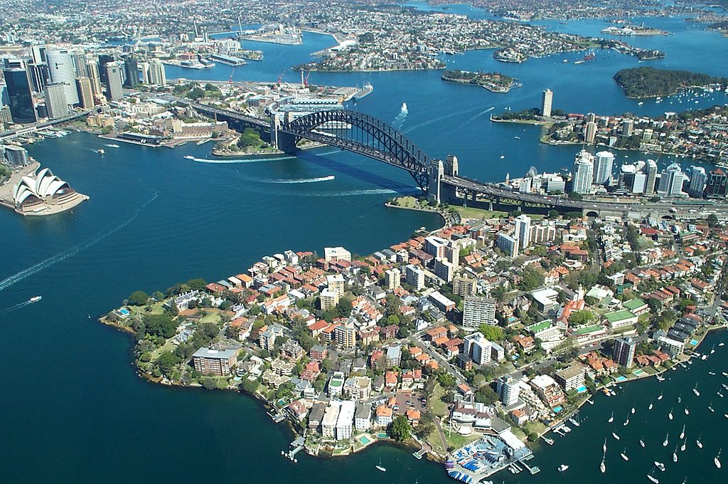 Sydney Harbour shot taken from the air. Bridge with the Opera house to the side Image: Rodney Haywood