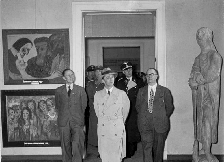 Goebbels views the Degenerate Art exhibition. Image Source: German Federal Archives
