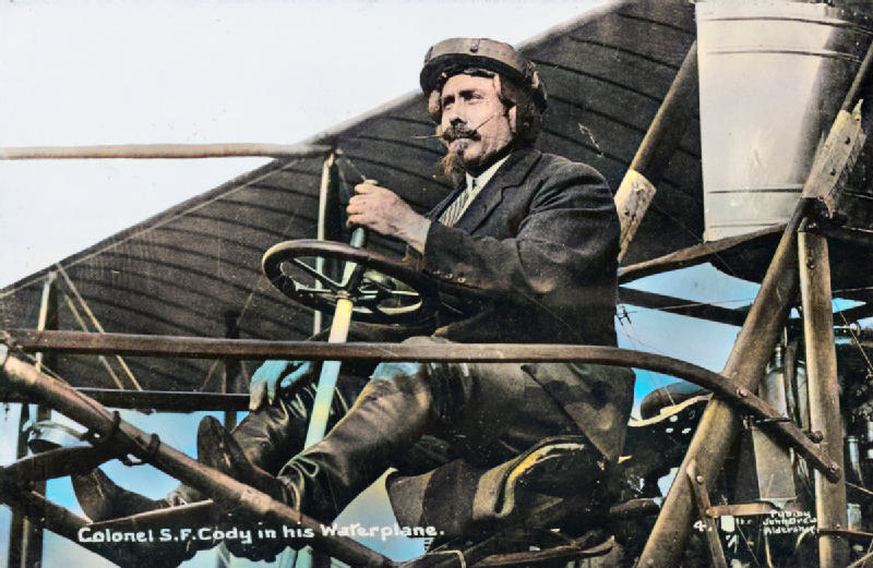 A close up of Cody wearing his flying helmet in the cockpit of the Cody aircraft mark V (1912)