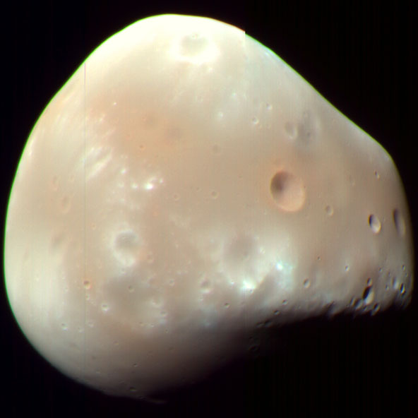 Color-enhanced image of Deimos, a moon of Mars, captured by the HiRISE instrument on the Mars Reconnaissance Orbiter on 21 Feb 2009.