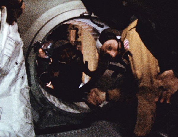 Astronaut Thomas P. Stafford (in foreground) and cosmonaut Aleksei A. Leonov make their historic handshake in space on July 17, 1975 during the joint U.S.-USSR Apollo Soyuz Test Project (ASTP)