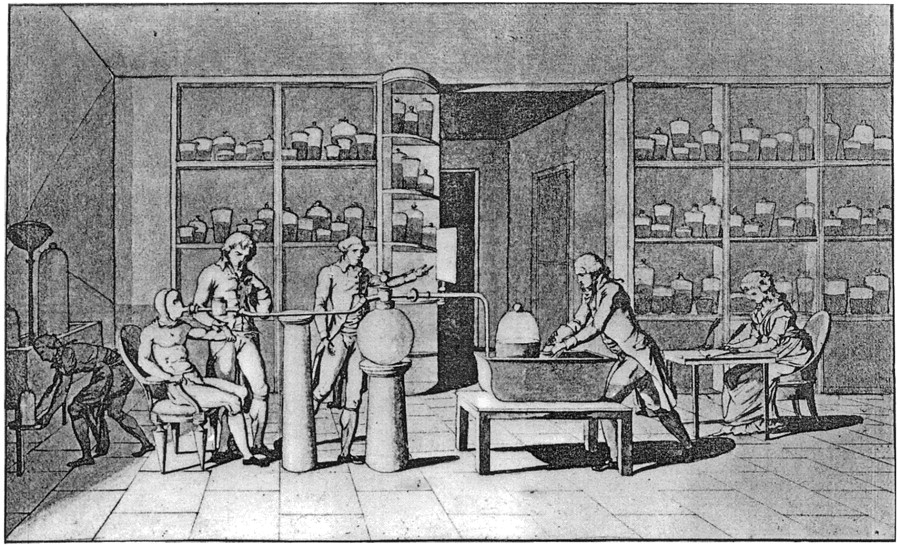 Lavoisier conducting an experiment on respiration in the 1770s