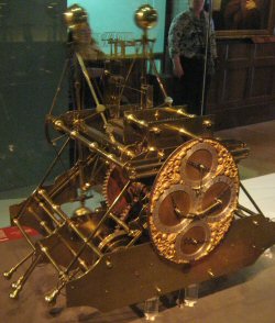  John Harrison's H1 marine chronometer. It took Harrison about five years to develop this chronometer. Its sea trial was in 1735 on HMS Centurion to Lisbon and HMS Orford returning to England. It weighs 34 kilograms (75 lb) and was originally housed in a glazed wooden case about 120 centimetres (3.9 ft) in each dimension.