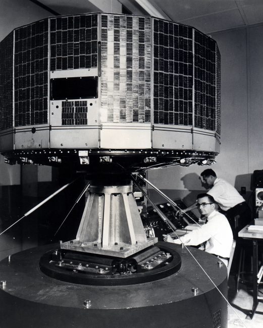 Scientist giving a vibration test to TIROS, Television Infrared Observation Satellite, at the Astro-Electronic Products Division of RCA in Princeton, New Jersey. 