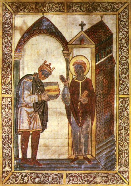 A page from a copy of Bede's Lives of St. Cuthbert, showing King Athelstan presenting the work to the saint. This manuscript was given to St. Cuthbert's shrine in 934.[100]